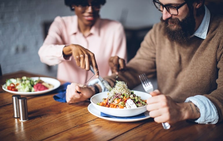 Couple at home sharing dinner on the Flexitarian Diet meal plan