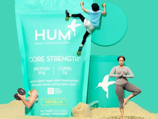 HUM Core Strength vegan protein powder in a fitness creative concept