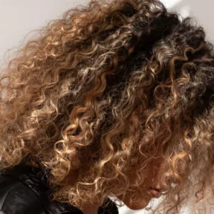 what causes hair breakage curly hair