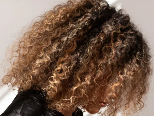 what causes hair breakage curly hair