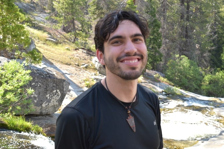 Manuel Miller, a HUM Diversify Dietetics Grant Recipient, outdoors smiling