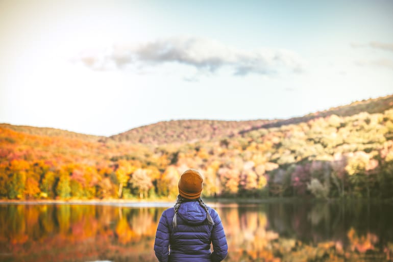 woman hiking in fall weather