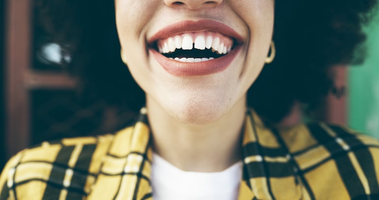 woman smiling with mouth open