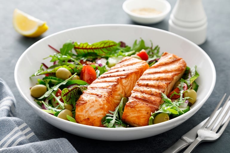 grilled salmon over greens