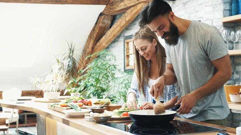 couple cooking dinner