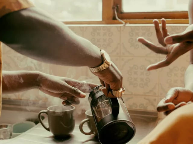 couple pouring coffee