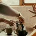 couple pouring coffee