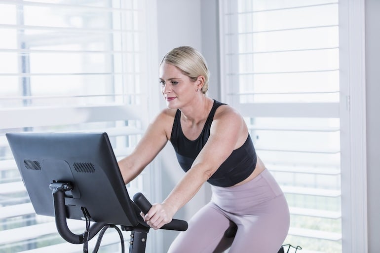 woman indoor cycling