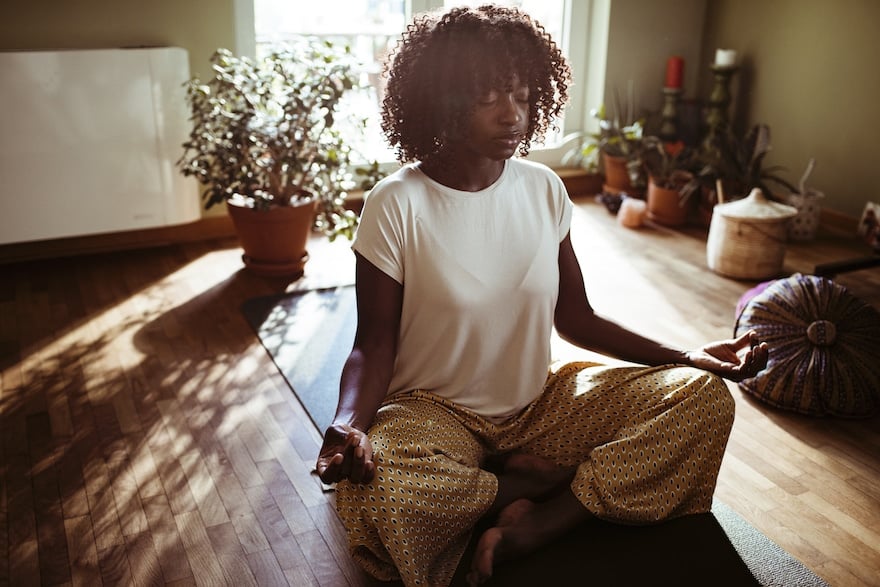 black history month journaling woman meditating