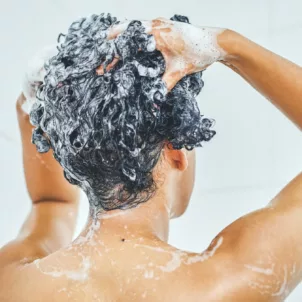 how often should you wash your hair woman in shower