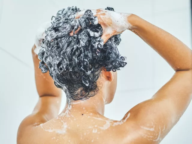 how often should you wash your hair woman in shower