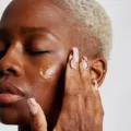 how to use retinol woman applying to skin