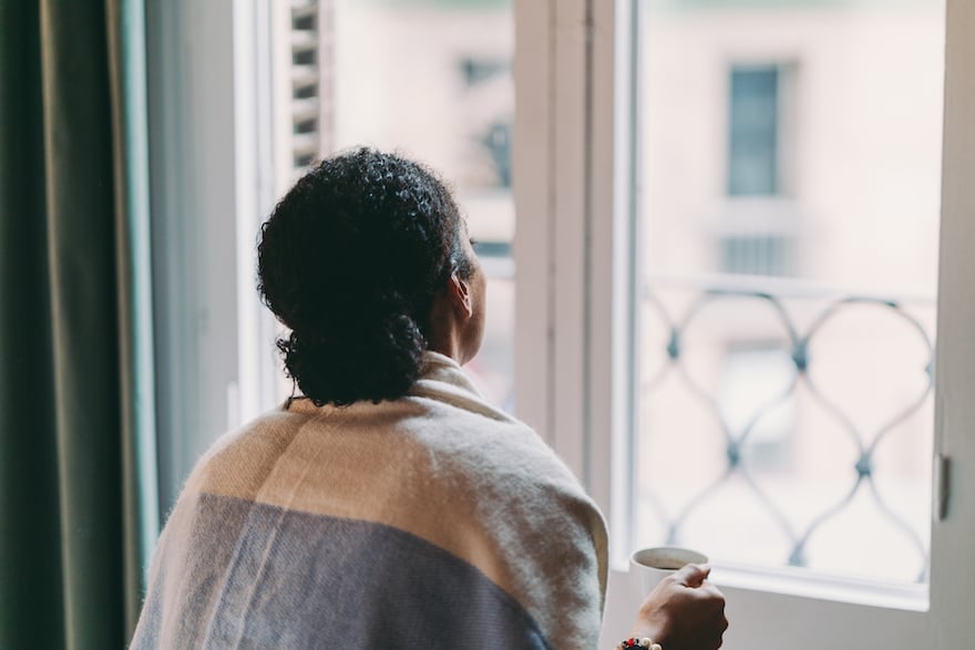 how to deal with loneliness woman at window