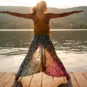 Woman doing yoga as part of her cycle syncing exercise routine