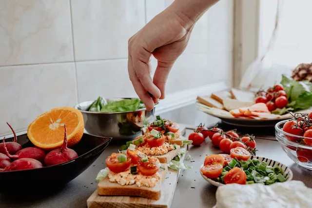 Man cooking a fresh meal with whole foods for a healthy diet plan