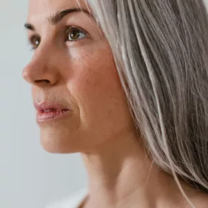 Model with gray hair due to age