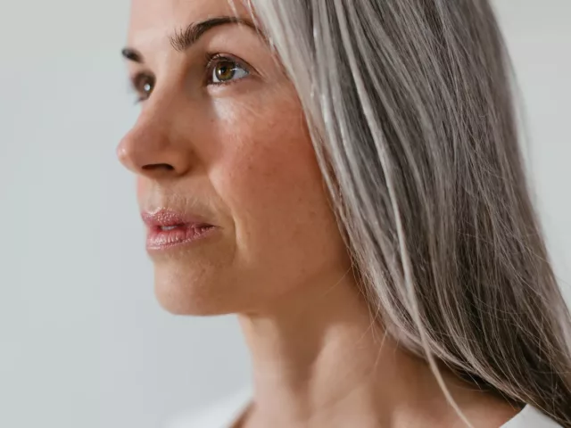 Model with gray hair due to age