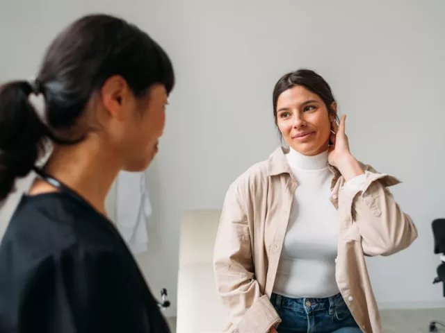 Woman at a functional medicine consultation